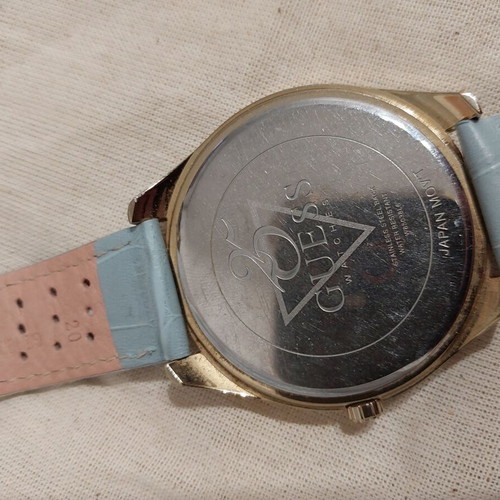 Guess 25th Anniversary Watch with Turquoise and Gold Colors