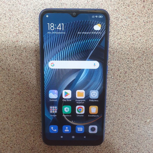 Redmi 9C smartphone with scratch-free screen, blue