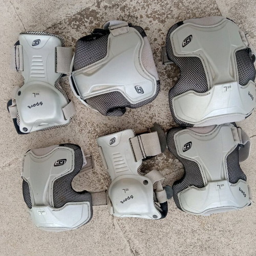 Skateboard used with protective gear for hands and feet