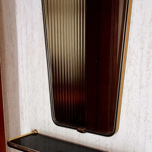 Vintage hanging wall shelf used with black glass and brass