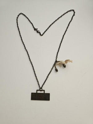 Vintage necklace with cassette player pendant and headphones used