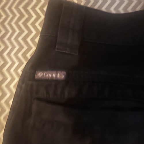 Columbia black outdoor cargo pants, men's size 32/34