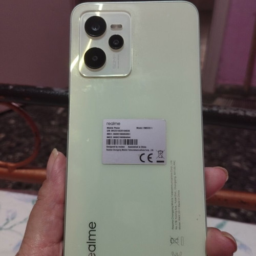 Realme smartphone, pistachio color, 6.6-inch screen