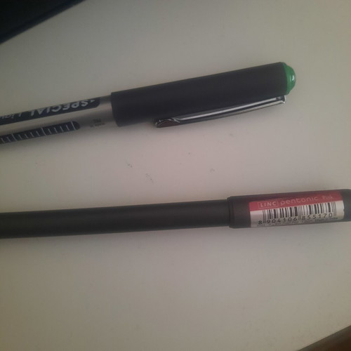Pencils pens erasers and sharpener set used