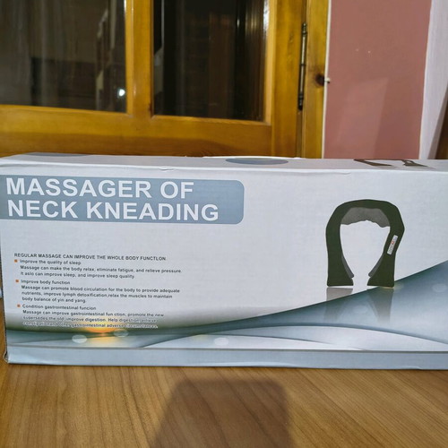 Neck massage device new in excellent condition