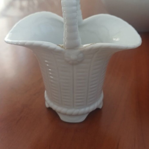 Porcelain decorative item used with a broken handle