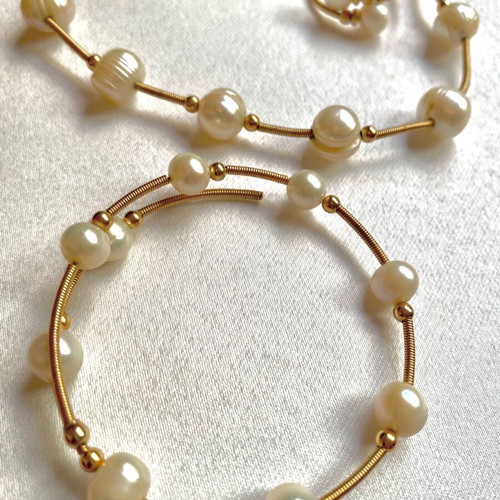 Modern jewelry set with natural pearls by Al'Oro