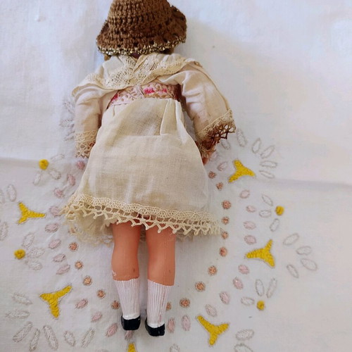 Celluloid collectible doll with stamp and numbering 175