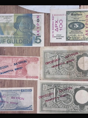 Decorative assorted used banknotes and game coupons