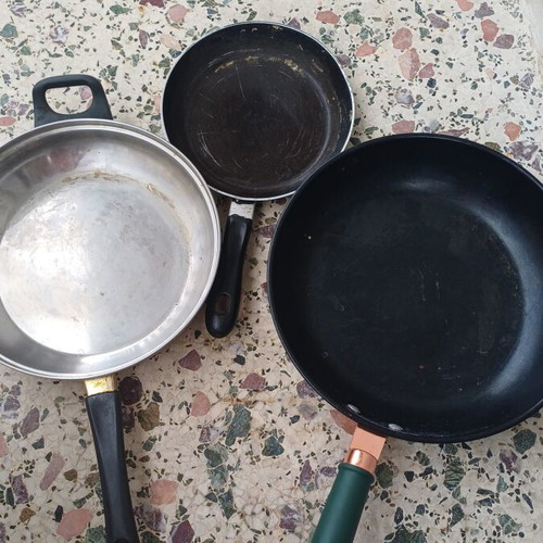 Set of 3 frying pans used, one with lid