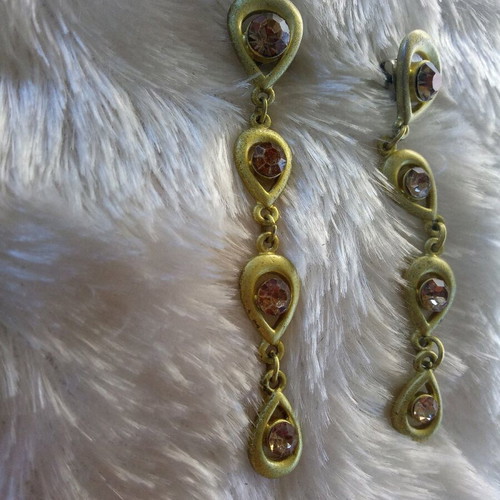 Long drop earrings new with gold tone and brownish crystals