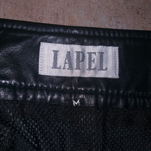 Lapel mini skirt made of genuine leather used, size M