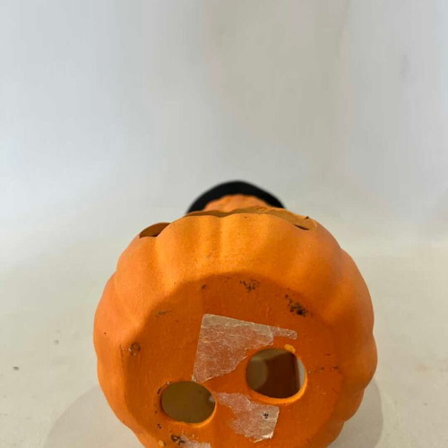 Ceramic Halloween pumpkin candle holder used