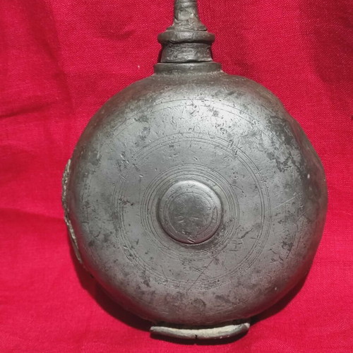 Collectible tin flask used (1870-1910)