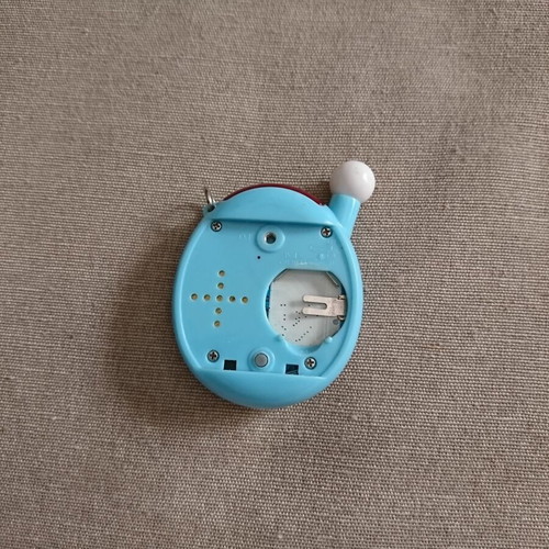 Tamagotchi Connection V4 blue used with cloud pattern