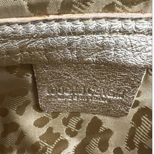 Roberto Cavalli silk clutch used with signs of wear and discoloration