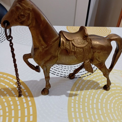 Vintage bronze horse with removable saddle and chain
