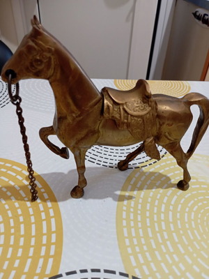 Vintage bronze horse with removable saddle and chain