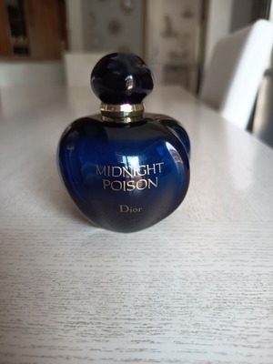 Cristian Dior Midnight Poison empty perfume bottle