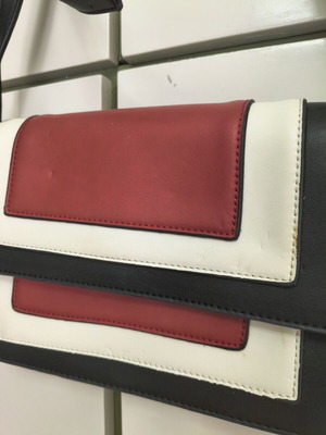 Shoulder bag with adjustable strap, black and red