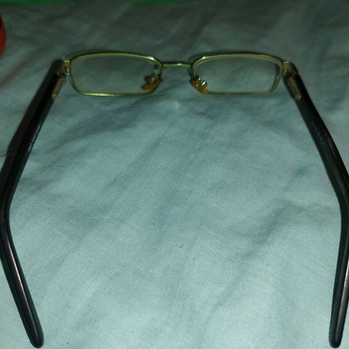 Children's prescription glasses used, black and green