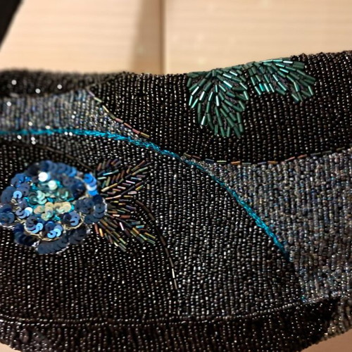 Accessorize evening bag like new with full embroidery