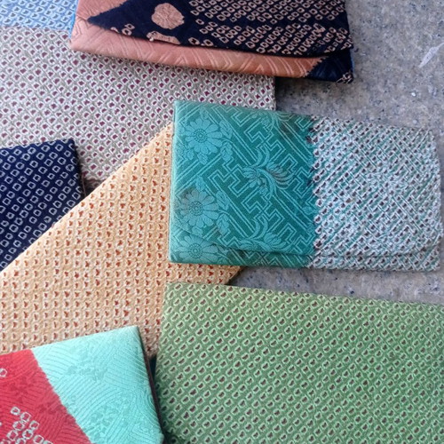 Fabric wallet cases used, all together