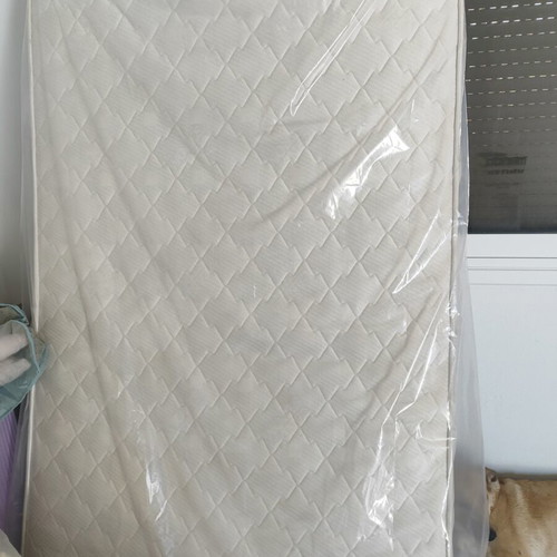 Single mattress used, white color, quilted with handles