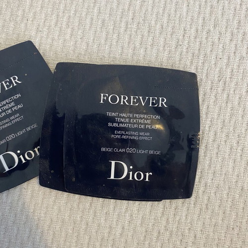 Dior toiletry bag and Forever Dior set like new