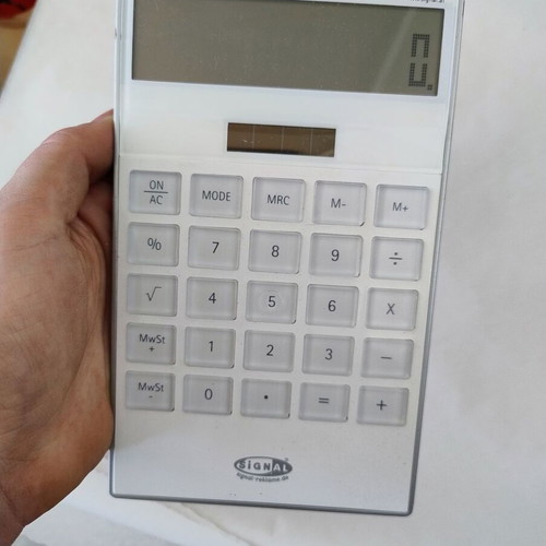 Calculator used, missing battery cover