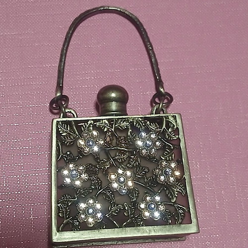 Vintage perfume bottle in Art Nouveau style, new