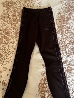 Adidas women's leggings new, brown with leopard detail, size Small