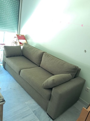 Two-seater sofa with detachable bed like new, olive color