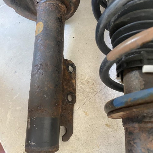 Ford Escort front shock absorbers complete with springs and mounts used