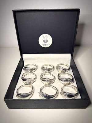 Handmade napkin rings, box of 9, like new