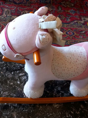 Vintage children's rocking animal used, pink with wear