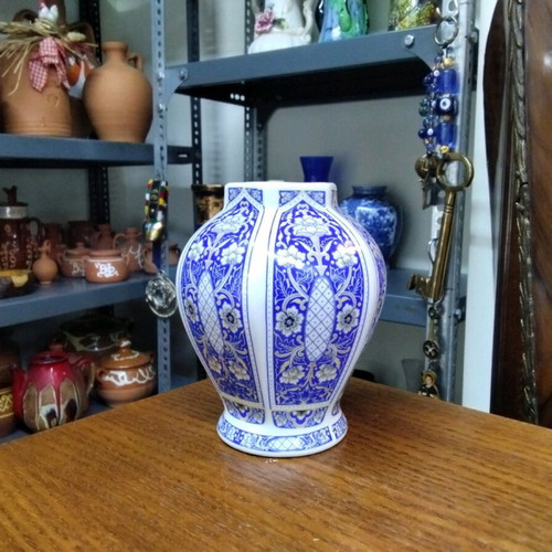 Handmade porcelain vase like new, blue with patterns