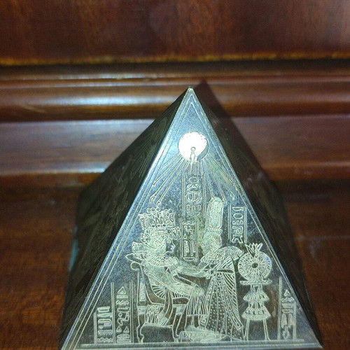 Small antique pyramid with Egyptian gold-plated brass miniatures used