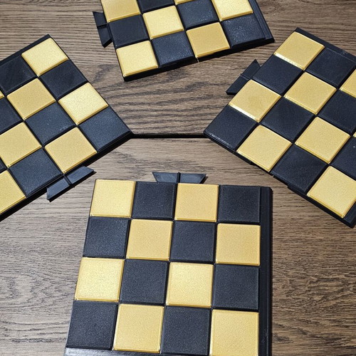 Chessboard in black and gold color, new