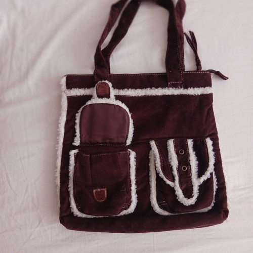 Denim bag like new with fluffy trim, brown