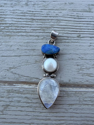 Silver pendant with natural stones