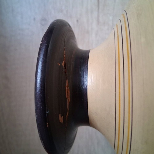 Clay vase used with repaired neck