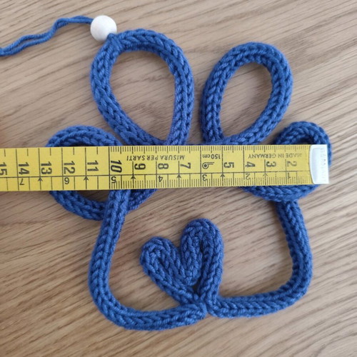 Knitted decorative paw with heart new, handmade