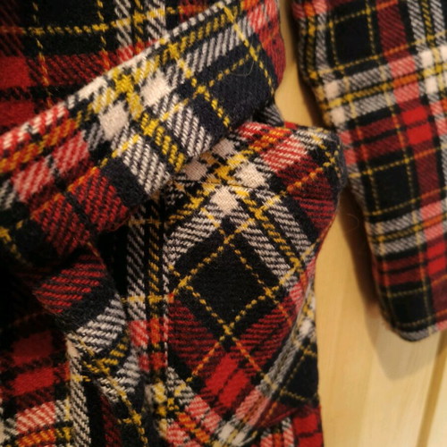 Checked coat size Small like new with belt and stitched pockets