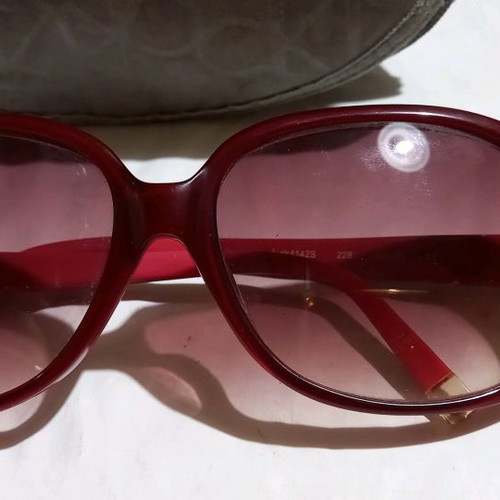 Calvin Klein sunglasses used, red frame with brown gradient lenses