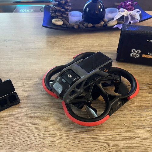DJI Avata drone used with ND filters, 4 batteries, charger, and extras