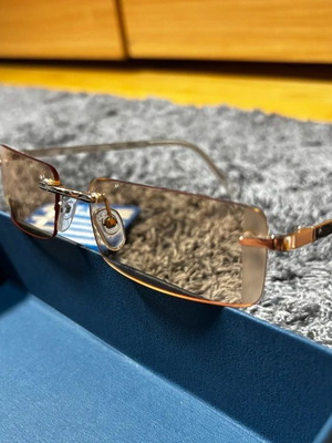 Top sunglasses with orange lenses