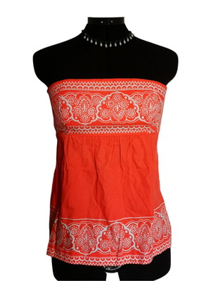 Orange strapless Benetton top like new with white patterns