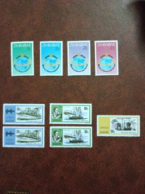 Rwanda and Zimbabwe stamps new, incomplete sets