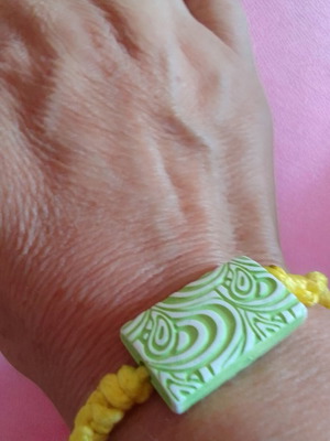 Macrame bracelet new in yellow with green and white bead